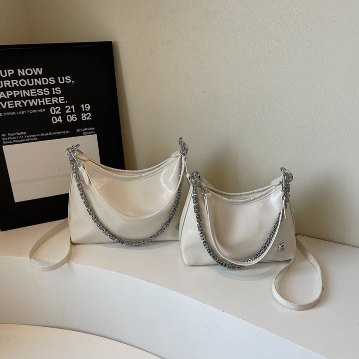 Damen moderne Umhängetasche mit auffälligem Kettenriemen Nord Taschen