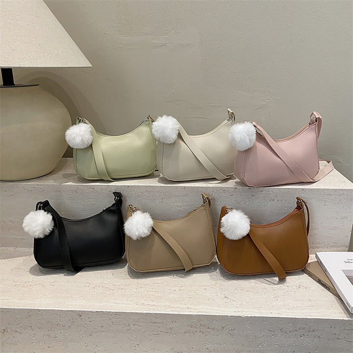 Damen Handtasche aus hochwertigem Kunstleder mit abnehmbarem Kunstfell
