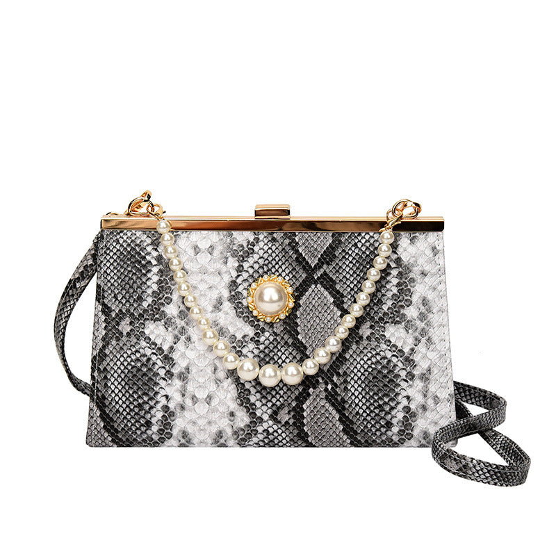 Damen elegante Abendtasche im Schlangenleder-Look mit Perlenakzent Nord Taschen