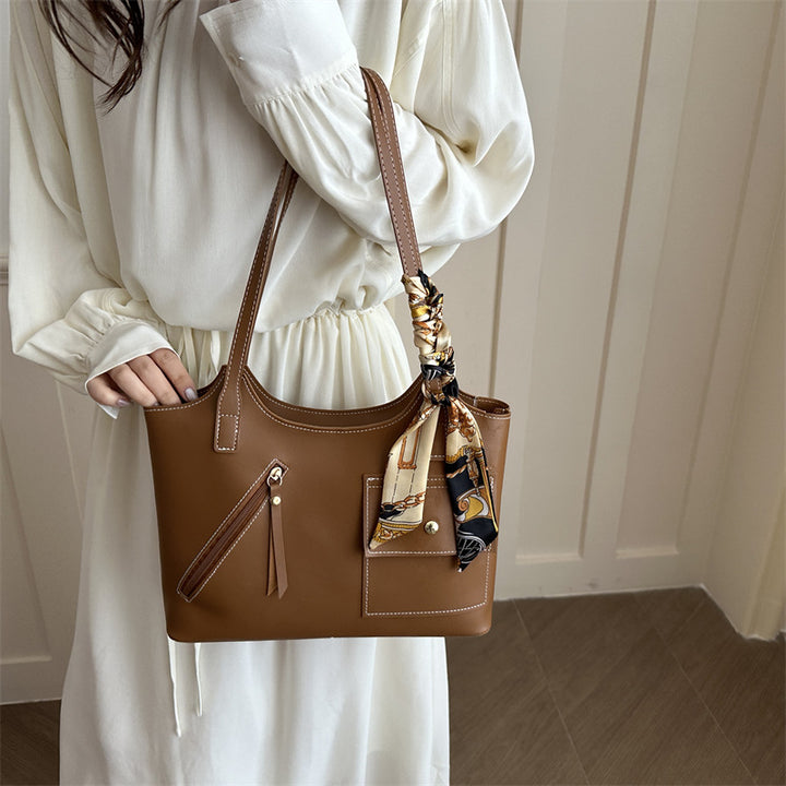 Damen moderne Handtasche mit praktischen Fächern und kreativen Designelementen Nord Taschen