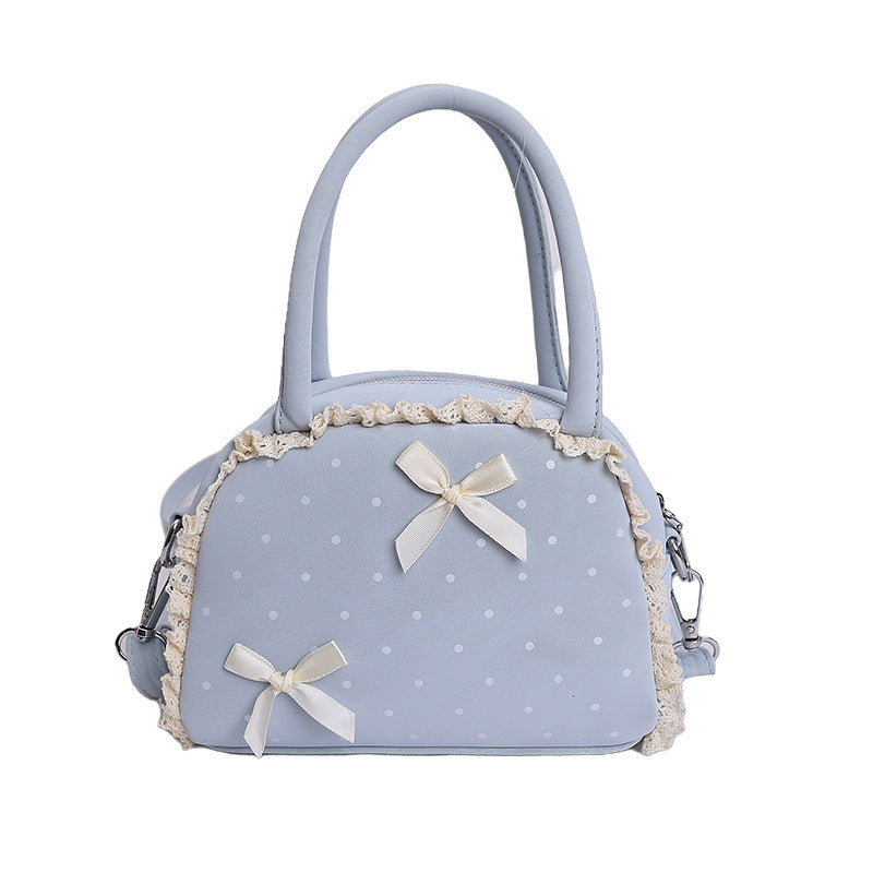 Damen modische Handtasche im verspielt romantischen Design mit Schleifenakzenten Nord Taschen