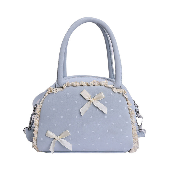Damen modische Handtasche im verspielt romantischen Design mit Schleifenakzenten Nord Taschen