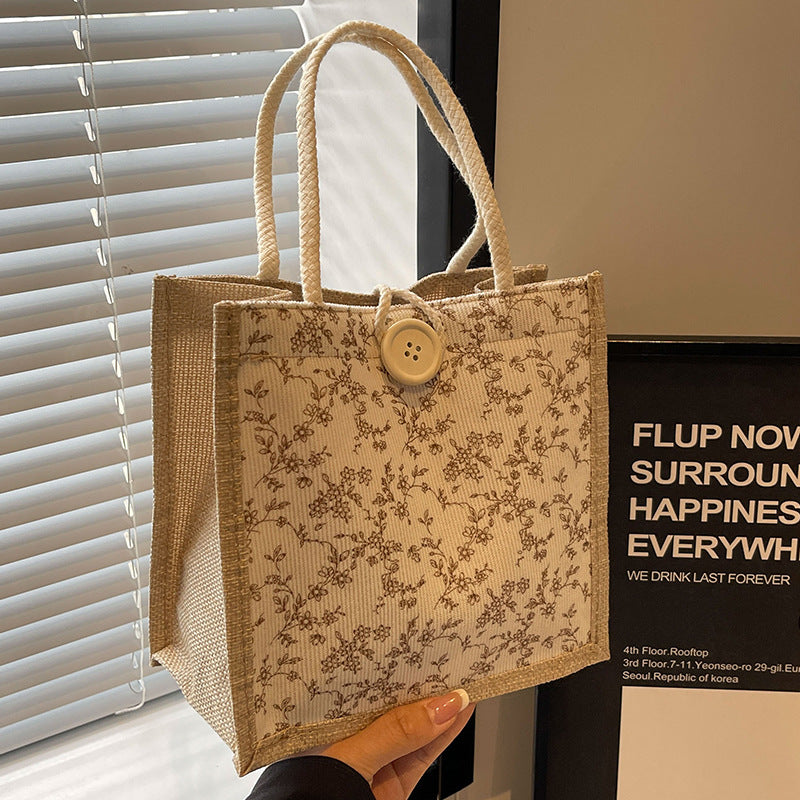 Damen Handtasche mit floralem Design und robusten Griffen Nord Taschen
