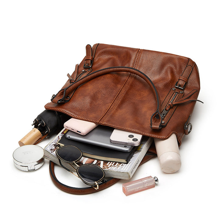 Damen Hobo-Tasche mit eleganten Tragegriffen und funktionalem Innenlayout Nord Taschen