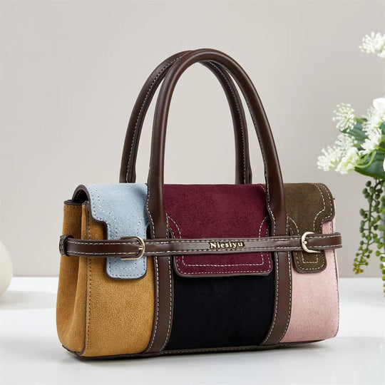 Damen dezente Handtasche aus hochwertigem Wildleder mit strukturiertem Design und dekorativem Tragegurt Nord Taschen