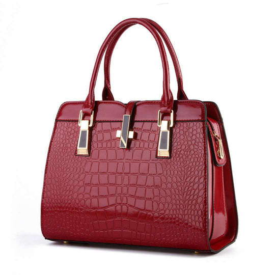 Damen Handtasche mit luxuriösem Krokodilleder-Look und goldenen Akzenten Nord Taschen