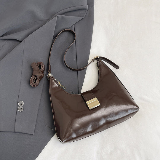 Damen Umhängetasche aus hochwertigem Kunstleder mit elegantem Klappverschluss Nord Taschen