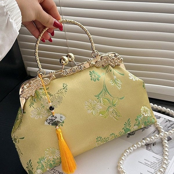 Damen elegante Umhängetasche mit floralem Design und goldenen Akzenten Nord Taschen