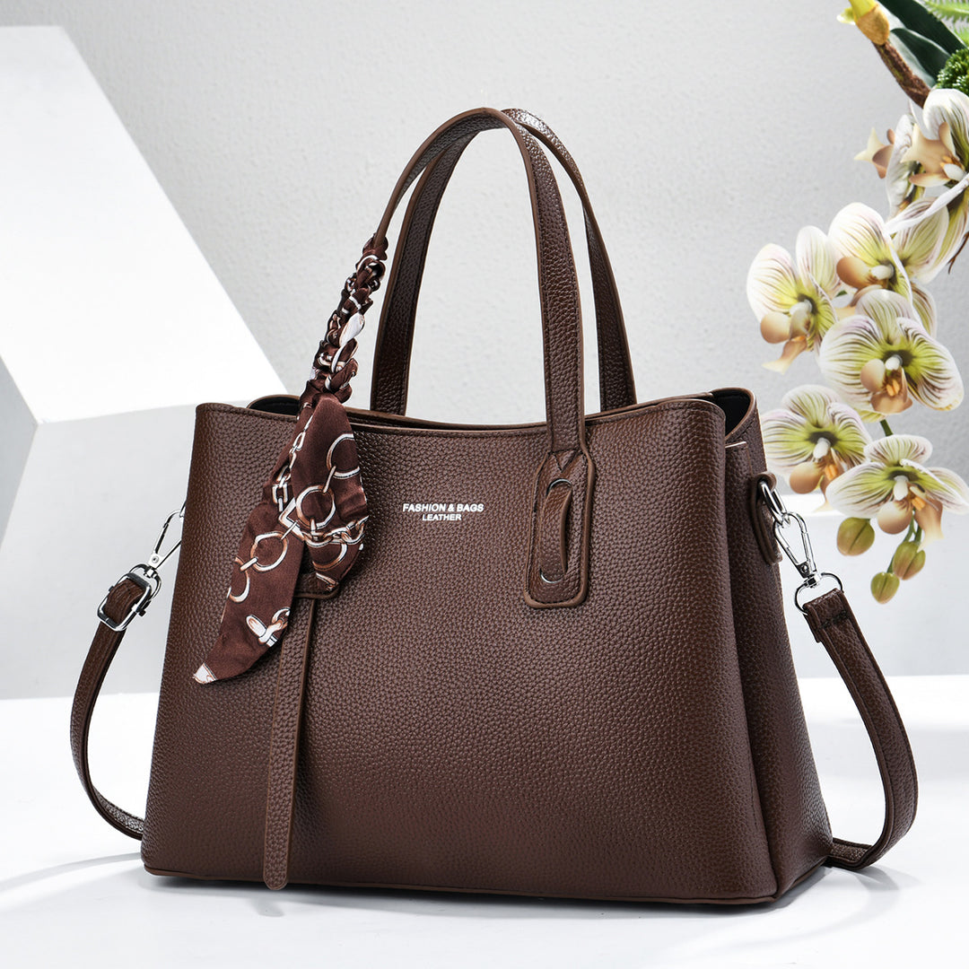 Damen elegante Handtasche mit dekorativem Schal Nord Taschen
