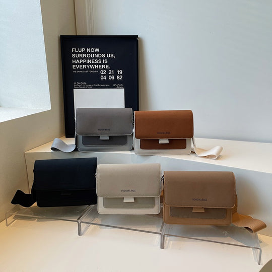 Damen Umhängetasche mit innovativem Klappverschluss und hochwertigen Akzenten Nord Taschen