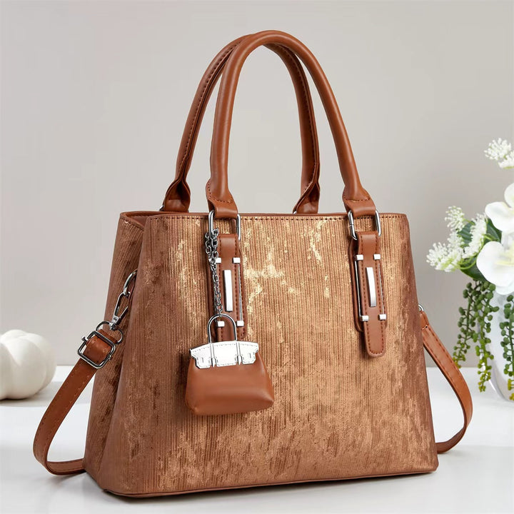 Damen elegante Handtasche mit dekorativem Schlüsselanhänger Nord Taschen