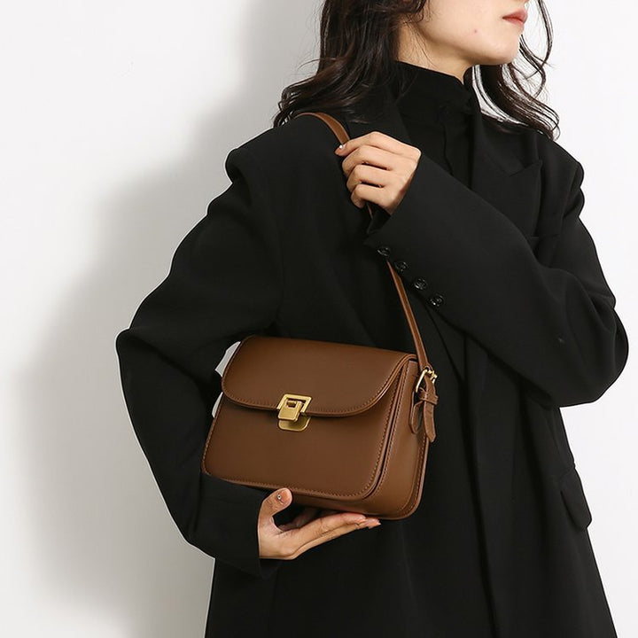 Damen elegante Umhängetasche aus hochwertigem Kunstleder mit stilvollem Verschluss Nord Taschen
