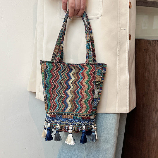 Damen Jute-Tragetasche mit modernem Ethnodruck und trendigen Quasten Nord Taschen