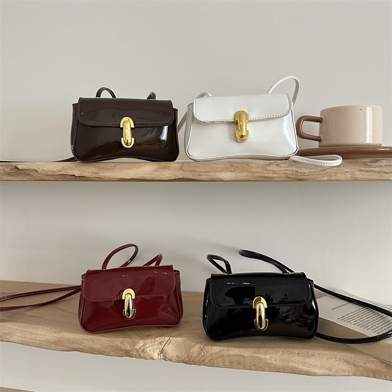 Damen Mini-Umhängetasche mit glamourösem Klappverschluss Nord Taschen