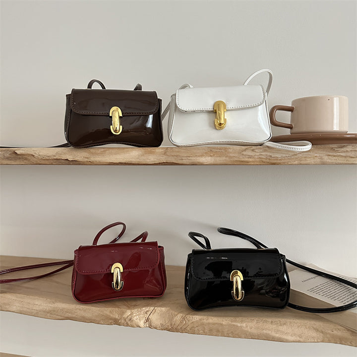 Damen Mini-Umhängetasche mit glamourösem Klappverschluss Nord Taschen