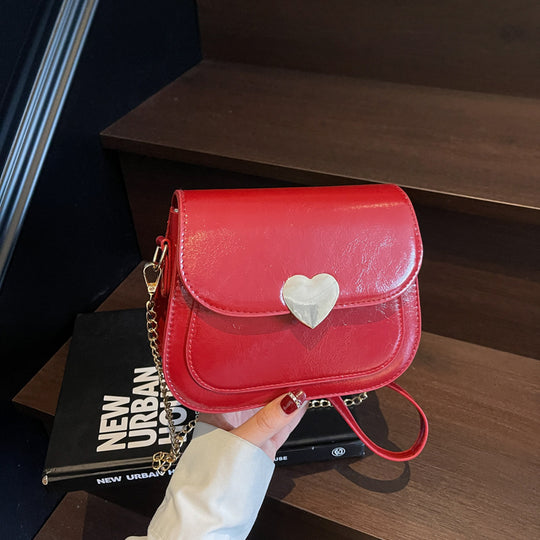 Damen elegante Umhängetasche mit Herzverschluss Nord Taschen