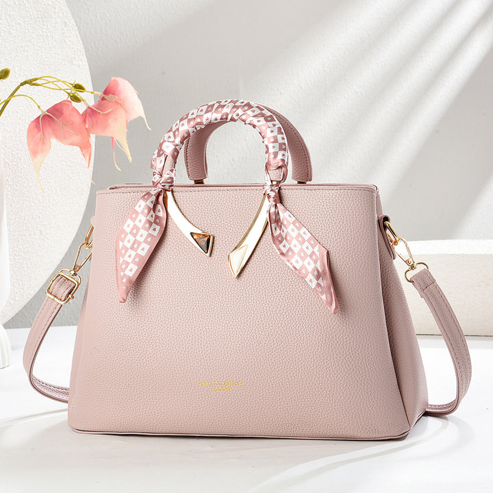 Damen elegante Handtasche mit dekorativer Schal-Applikation Nord Taschen