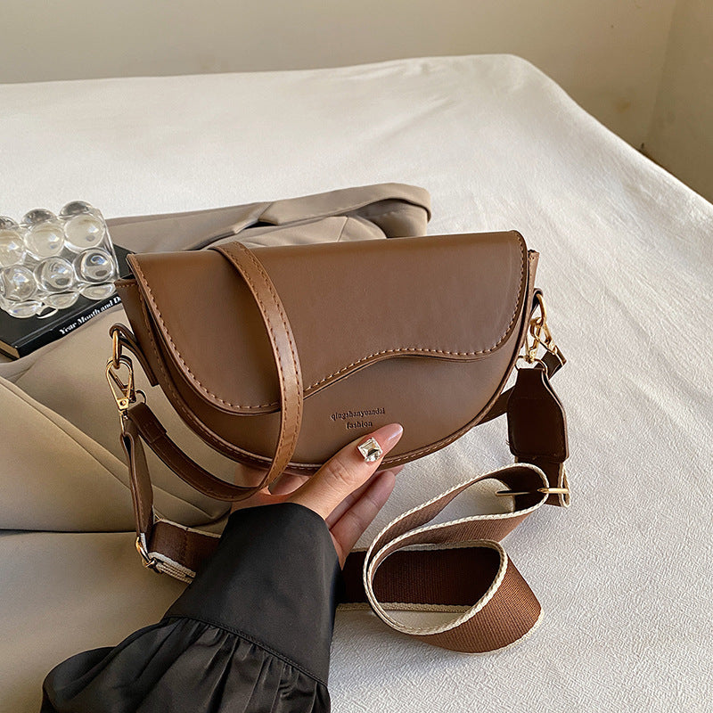 Damen Umhängetasche mit elegantem Kurvenmuster und praktischen Fächern Nord Taschen