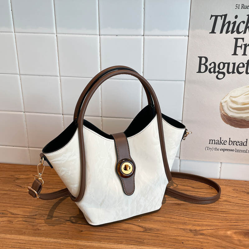 Damen elegante Umhängetasche mit einzigartigem Verschluss und strukturiertem Obermaterial Nord Taschen