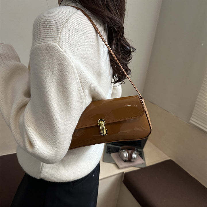 Damen elegante Umhängetasche mit luxuriösem Hochglanzdesign und praktischen Tragegriffen Nord Taschen