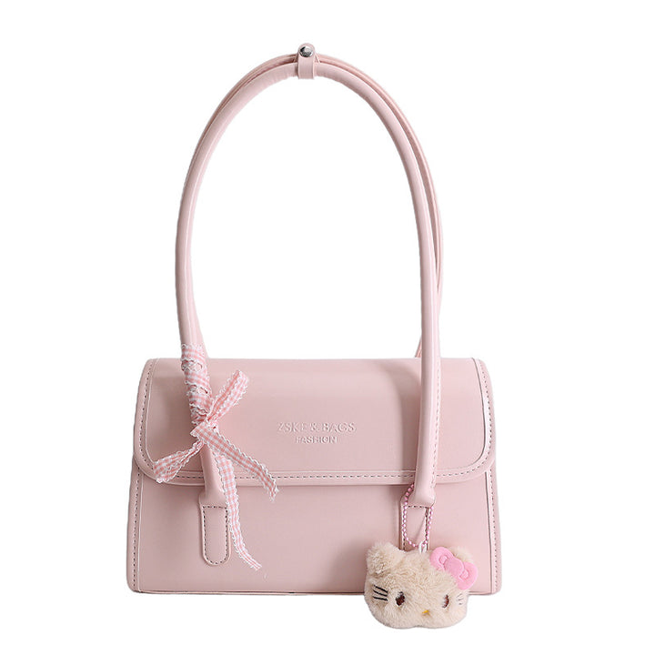 Damen elegante Handtasche mit verspieltem Stoffanhänger Nord Taschen