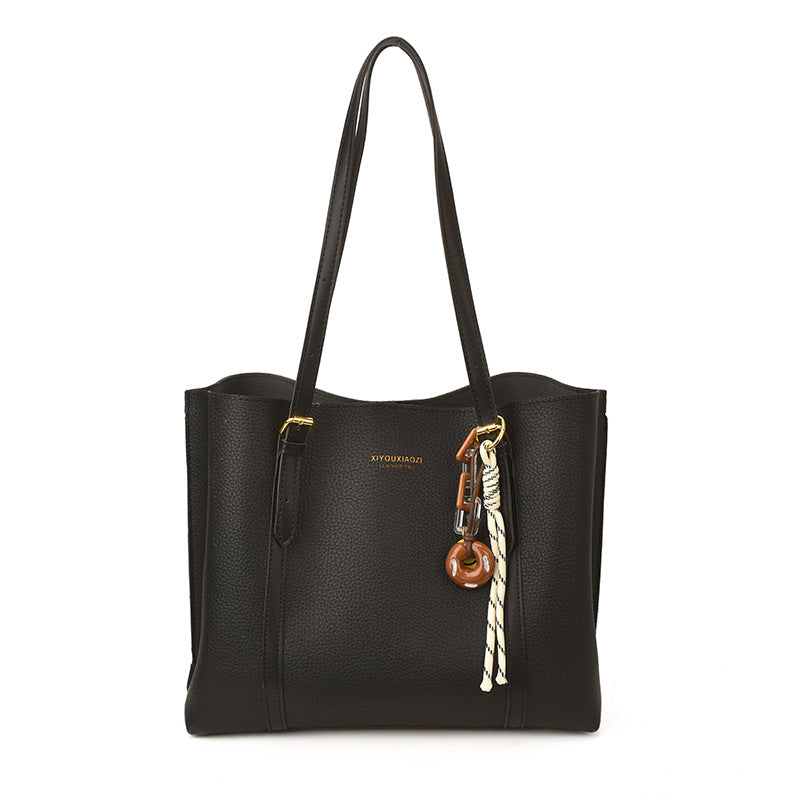 Damen elegante Handtasche im minimalistischen Stil mit einzigartigem Anhänger Nord Taschen