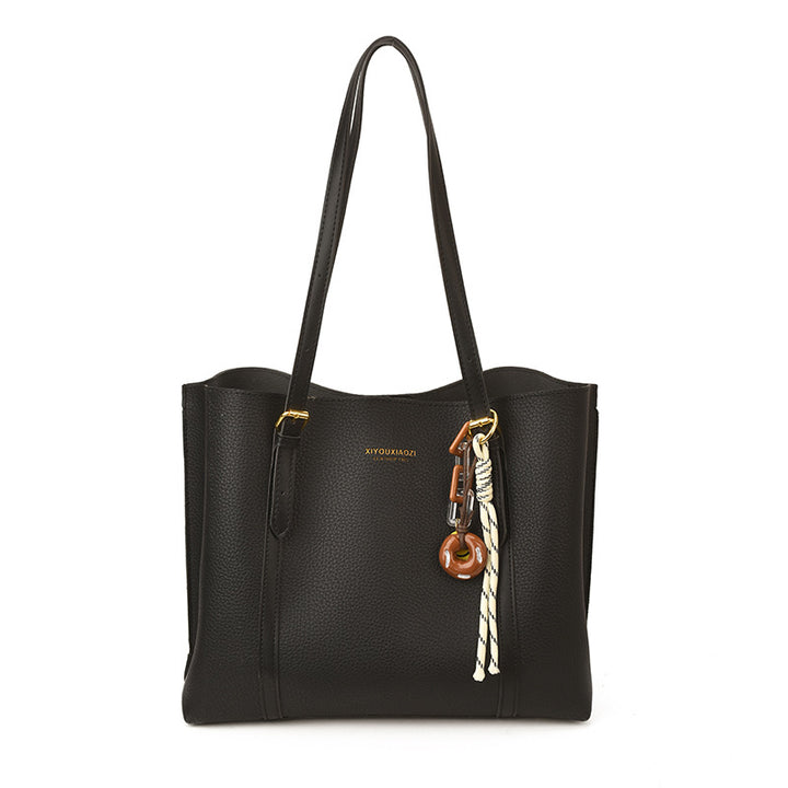 Damen elegante Handtasche im minimalistischen Stil mit einzigartigem Anhänger Nord Taschen