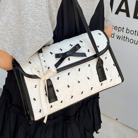 Damen Umhängetasche mit floralem Relief und elegantem Schleifenakzent Nord Taschen