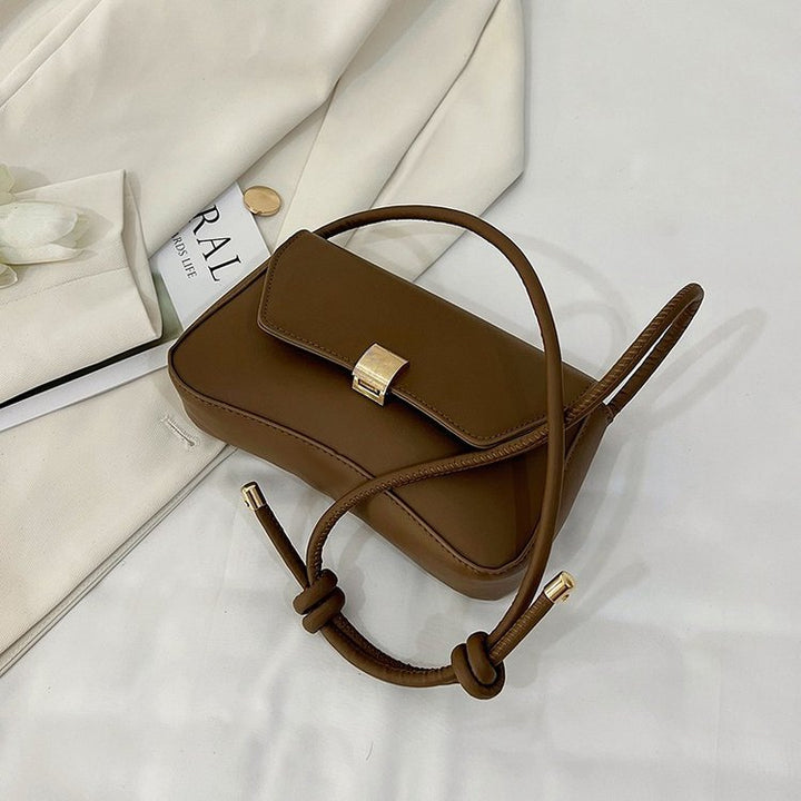Damen Umhängetasche mit verstellbarem Tragegurt und eleganter Schnappverschluss Nord Taschen