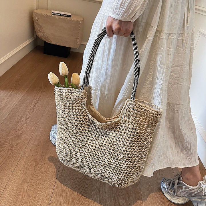 Damen Strandtasche aus handgewebtem Naturmaterial mit gestreiften Griffen Nord Taschen