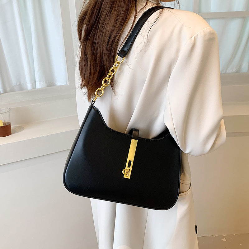 Damen Schultertasche mit elegantem Kettenverschluss und modernem Design Nord Taschen