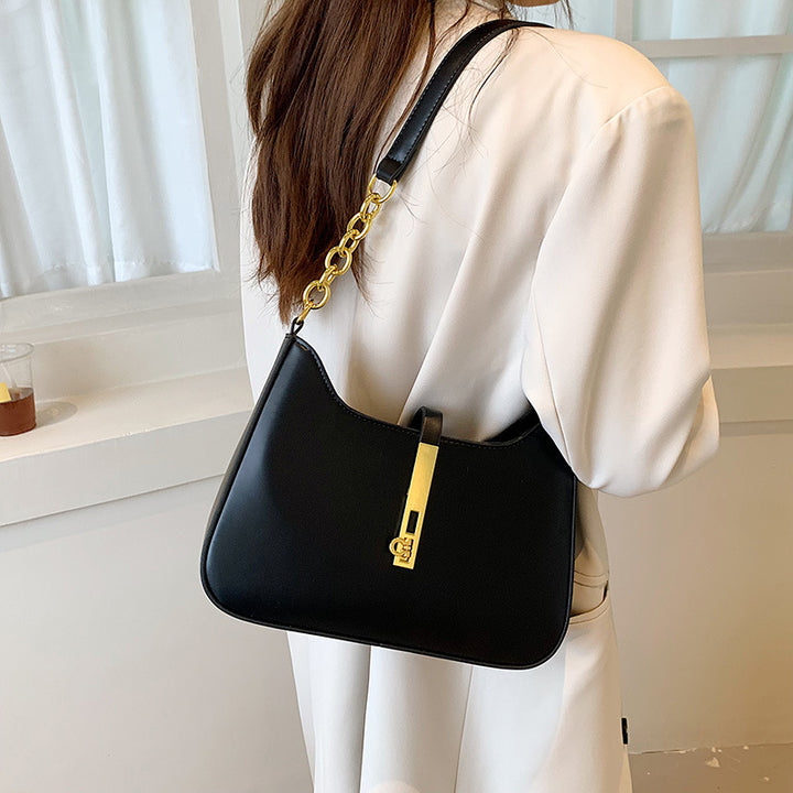 Damen Schultertasche mit elegantem Kettenverschluss und modernem Design Nord Taschen