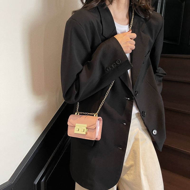 Damen elegante Mini-Handtasche mit goldener Verschlussmechanik Nord Taschen