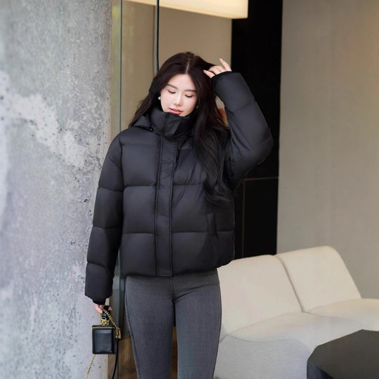 Damen Kurz geschnittene Oversize-Steppjacke mit XXL-Kapuze und thermischer Isolierung Nord Taschen