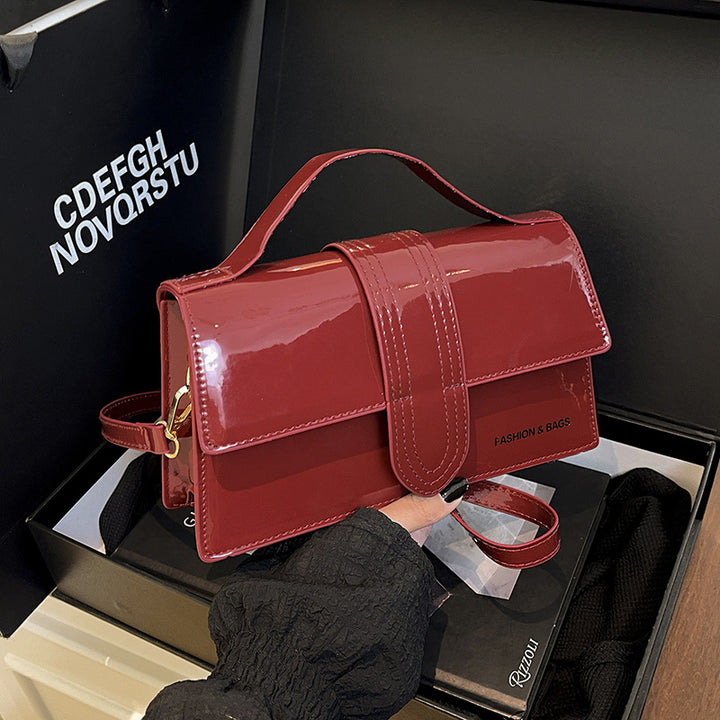 Damen elegante Lackleder-Handtasche mit praktischer Umhängemöglichkeit Nord Taschen