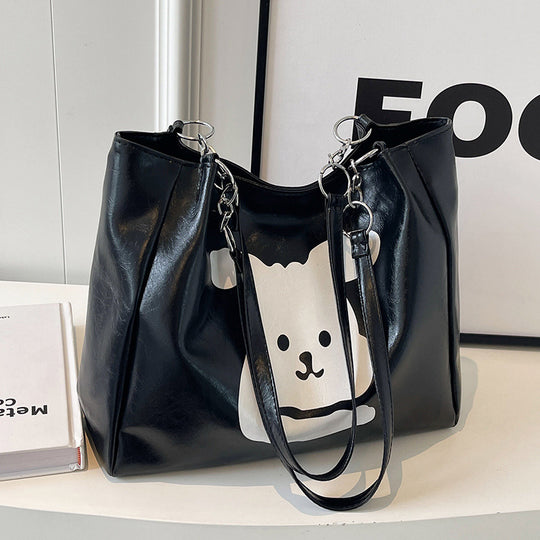 Damen Umhängetasche aus hochwertigem Kunstleder mit verspieltem Tierdesign Nord Taschen