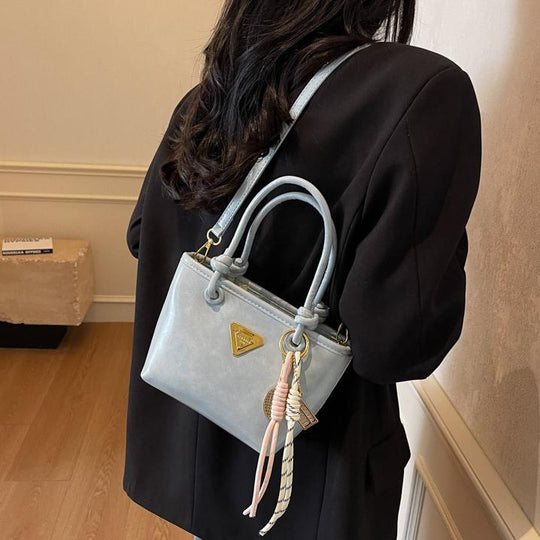 Damen Mini-Handtasche mit edlen Details und praktischem Umhängeriemen | Nord Taschen