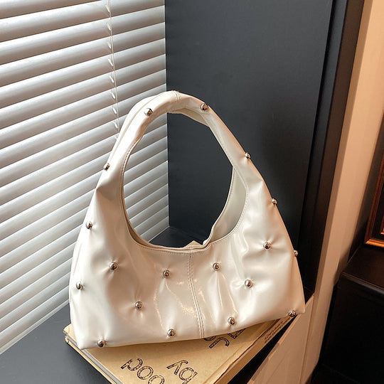 Damen glänzende Handtasche mit strukturiertem Design Nord Taschen