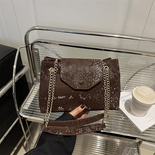 Damen elegante Umhängetasche mit schimmerndem Schlangenprägung Nord Taschen