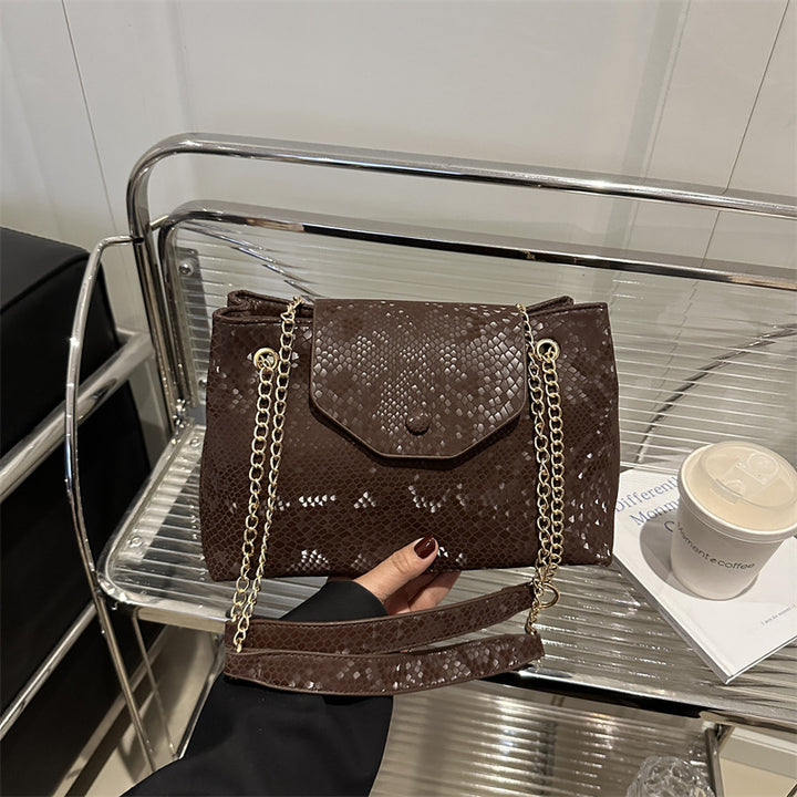 Damen elegante Umhängetasche mit schimmerndem Schlangenprägung Nord Taschen