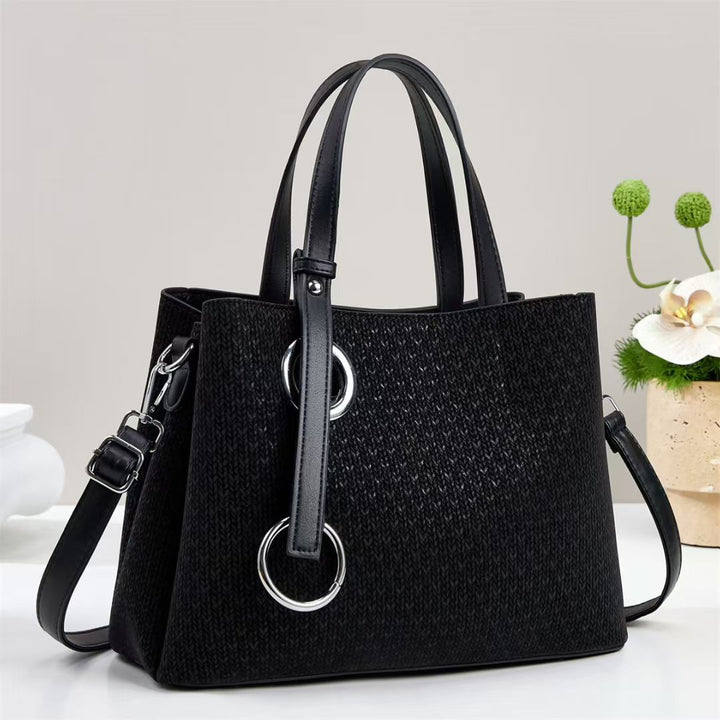 Damen Handtasche mit strukturiertem Design und eleganten Ringdetails Nord Taschen
