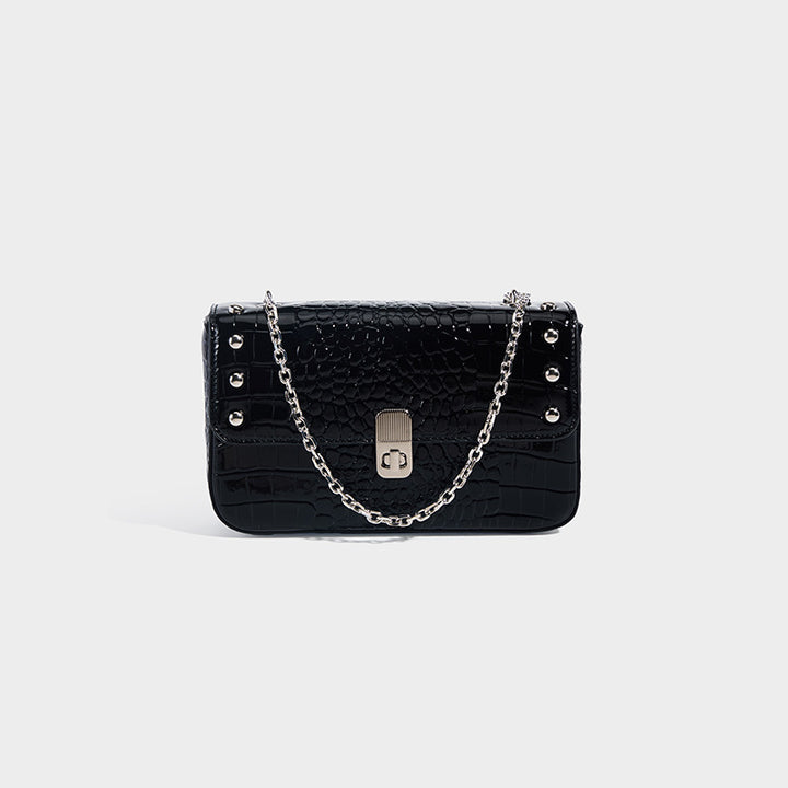 Damen Clutch mit eleganter Kroko-Optik und modischen Metallakzenten Nord Taschen