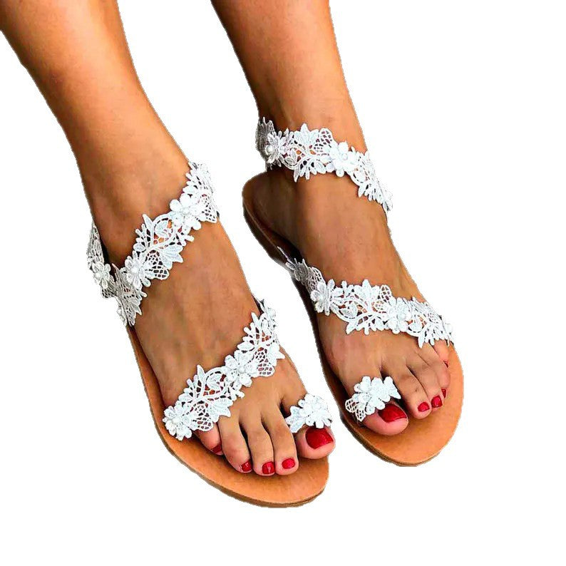 Damen Glamouröse und elegante Zehentrenner-Sandalen mit Perlenschmuck