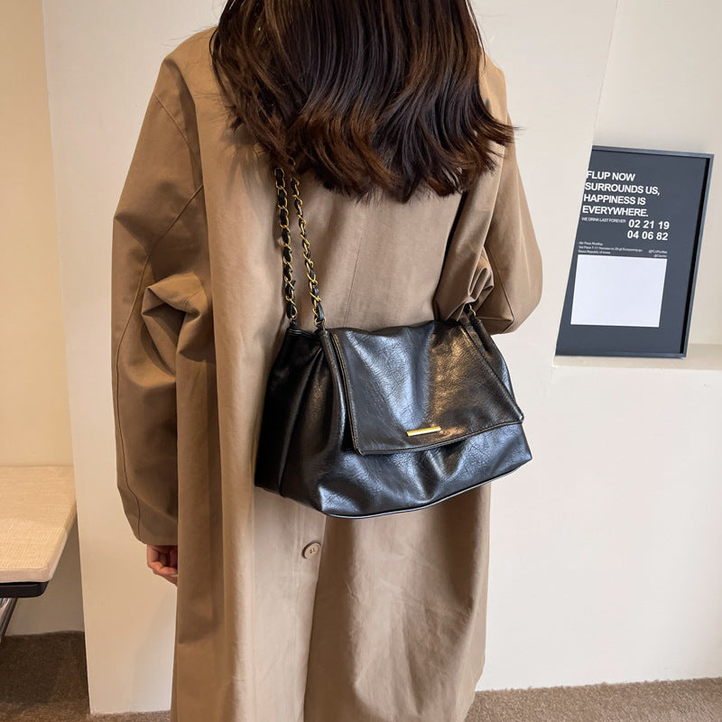 Damenhandtasche mit luxuriösem Kettenhenkel und weich strukturierter Oberfläche Nord Taschen