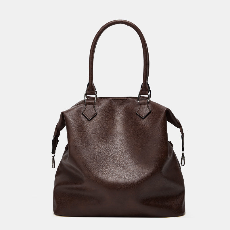Damen Handtasche mit verstellbarem Schulterriemen und eleganter Lederstruktur Nord Taschen