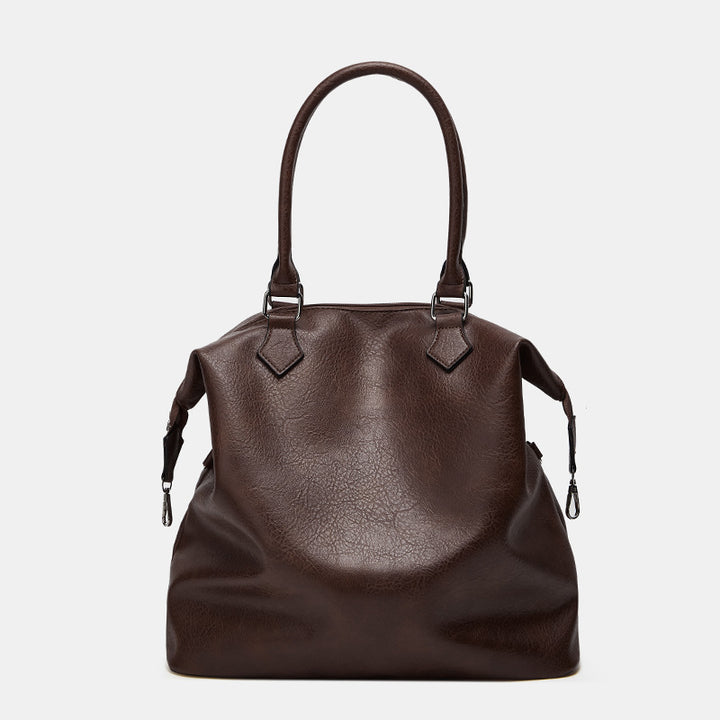 Damen Handtasche mit verstellbarem Schulterriemen und eleganter Lederstruktur Nord Taschen