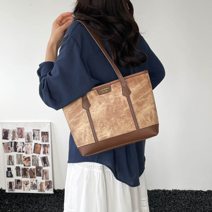Damen elegante Tragetasche mit verspieltem Anhänger Nord Taschen