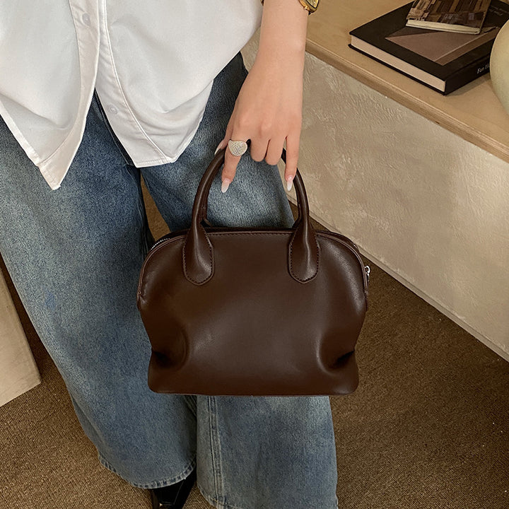 Damenhandtasche aus geschmeidigem Kunstleder, mit verstellbarem Schulterriemen und elegantem Design Nord Taschen