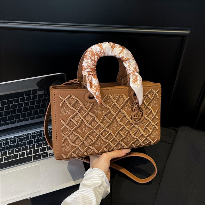 Damen elegante Handtasche mit strukturiertem Design und modischem Halsschal Nord Taschen