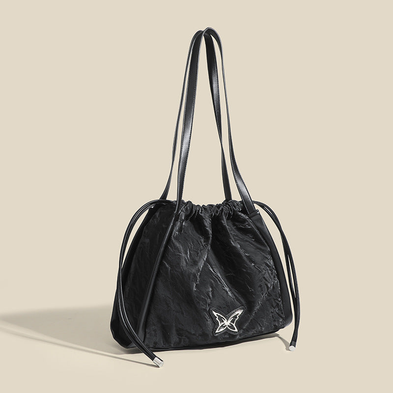 Damen Beuteltasche mit eleganter Kordelzug-Optik und einzigartigem Schmetterlingsmotiv Nord Taschen
